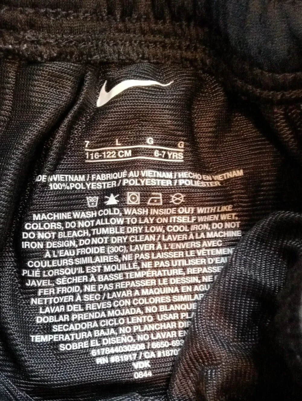 Nike Black Kids Mesh Athletic Shorts with White Swoosh